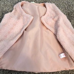 I am selling a cute over vest that is super soft